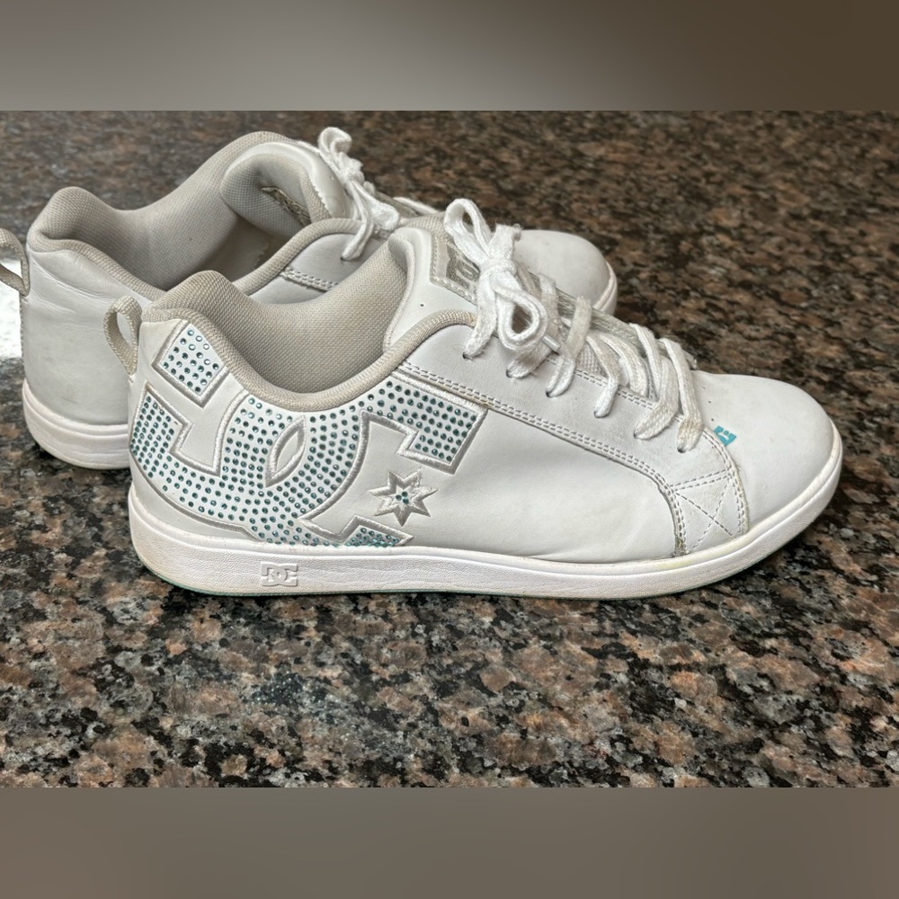 DC women’s size 10 white leather with blue rhinestones.